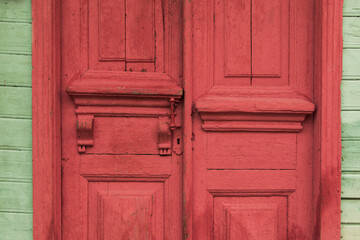 Old red wooden front door