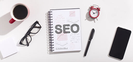 Word Seo On Notebook Over White Office Table Background, Collage