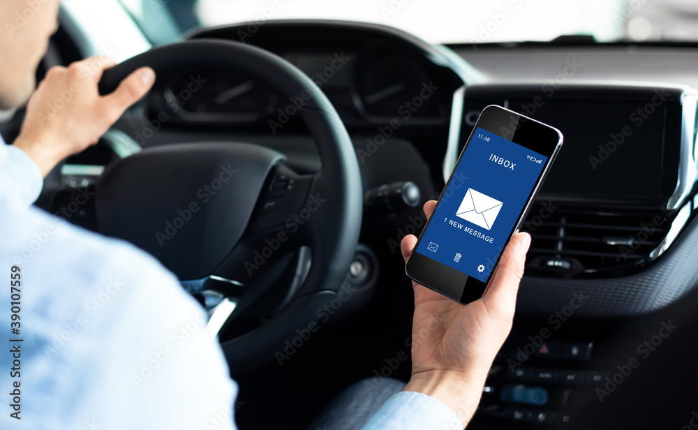 Poster Unrecognizable Man Using Cellphone Reading New E-Mail Message Driving Car