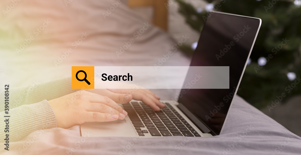 Poster unrecognizable woman browsing internet using laptop working at home
