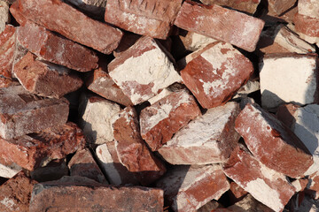 Pile of old red clay bricks Closeup,