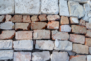 Background of red, orange, white old bricks 