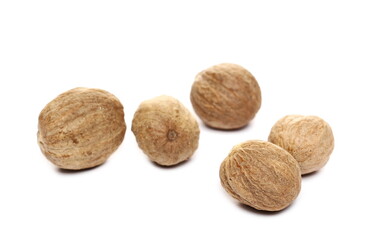 Nutmeg seeds isolated on white background