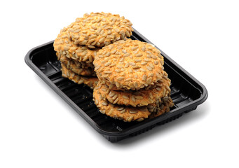 closeup large biscuits with sunflower seeds on white background
