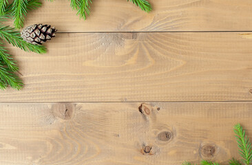 Christmas background with decorations on wooden board.