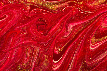 Abstract sparkling red background. Close up nail polish texture.