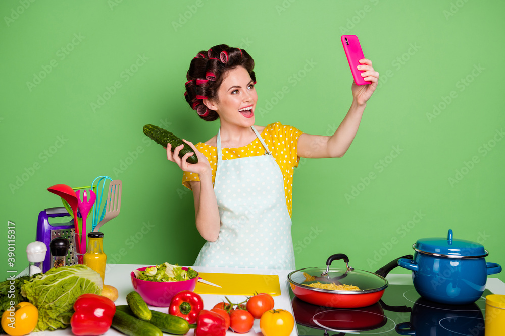 Sticker Portrait of her she nice attractive lovely pretty cheerful cheery funky housewife cooking domestic dish making selfie video blogging isolated over green pastel color background