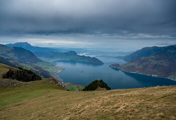 view from Niederbauen over Bürgenstock in direction of Lucerne on a rainy autumn day