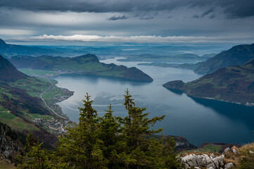 view from Niederbauen over Bürgenstock in direction of Lucerne on a rainy autumn day
