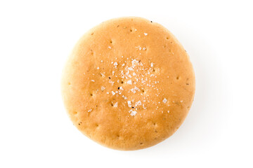 One lonely fresh round focaccia with salt crystals. Isolated on white.