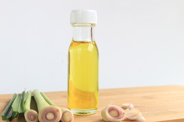Lemongrass, plants, vegetables and herbs of Thailand on wood against a white background.