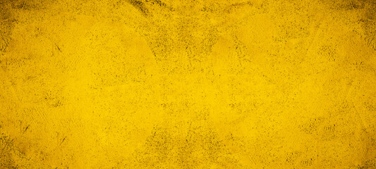 Dark black yellow golden stone concrete paper texture background banner, with space for text