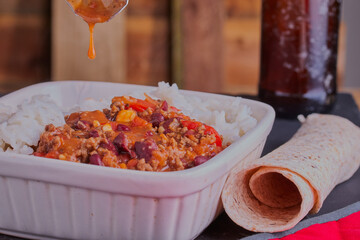 Chilli con carne with a wrap.