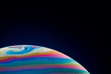 Half of a soap bubble, an abstract semicircle background. The model of the cosmos or the planets