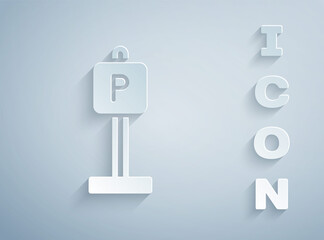 Paper cut Parking icon isolated on grey background. Street road sign. Paper art style. Vector.