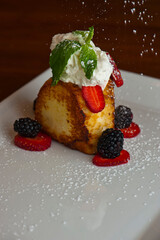 Lemon cake. Desserts. Classic American or French bakeries or pastry shop favorites. Cookies, whipped cream, cakes, chocolate syrup butter, eggs and and vanilla beans.