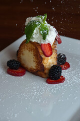 Lemon cake. Desserts. Classic American or French bakeries or pastry shop favorites. Cookies, whipped cream, cakes, chocolate syrup butter, eggs and and vanilla beans.