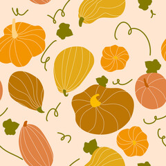 Pumpkin seamless pattern. Autumn decoration for Thanksgiving or harvest festival in orange and brown tones with green leaves. Vector repeating background