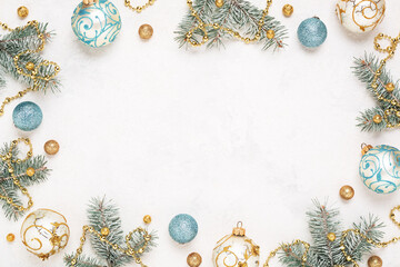 Christmas frame on white holiday background. Gold and blue christmas decorations, Copy space. New...