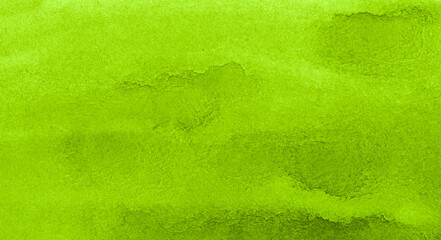 Vibrant green watercolor background. Lime texture on paper. Template for sites, postcards, posters.