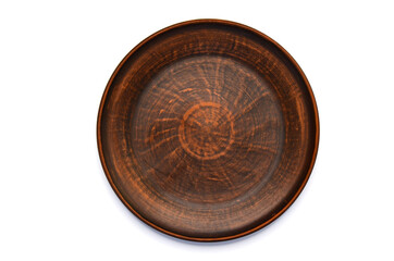 brown clay or ceramic plate isolated on a white background