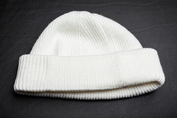 image of hat dark leather background 