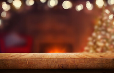 A Christmas wood tabletop product display with a festive background of tree lights and open fire...