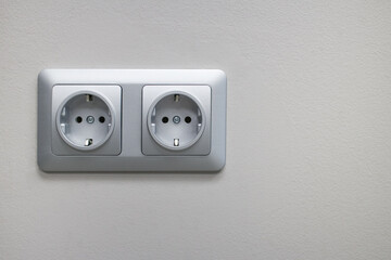 wall outlet after home renovation, gray plastic double socket European standard