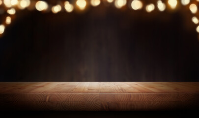 A Christmas wood tabletop product display with a festive background with a spot light on an empty...