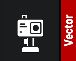 Fototapeta premium White Action extreme camera icon isolated on black background. Video camera equipment for filming extreme sports. Vector.