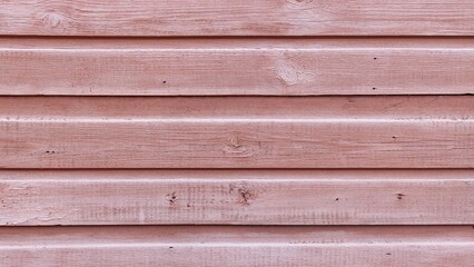 Painted horizontal boards of dirty pink color. Background for website design, poster.