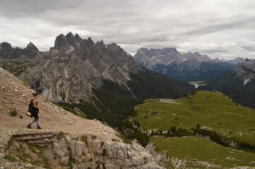 Naklejka na ściany i meble Hiking and climbing at the stunning Passo Giau in the Dolomite mountains of Northern Italy