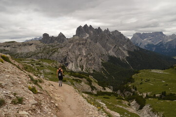 Fototapeta na wymiar Hiking and climbing at the stunning Passo Giau in the Dolomite mountains of Northern Italy