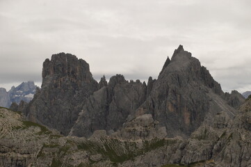 Hiking and climbing at the stunning Passo Giau in the Dolomite mountains of Northern Italy