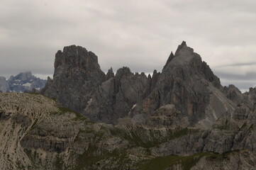 Hiking and climbing at the stunning Passo Giau in the Dolomite mountains of Northern Italy