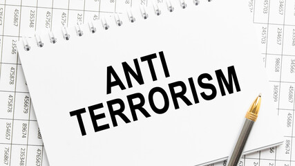 text ANTI TERRORISM in a magnifying glass, office concept, business concept, Finance