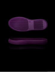 white shoe sole. Isolated on a black background.