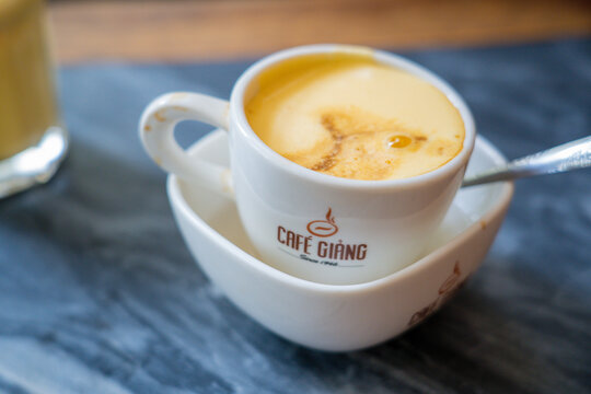 HANOI/VIETNAM - JULY 17: Restaurant name tag Egg Coffee Cafe Trung Local Coffee shop dessert CAFE GIANG in OLD QUARTER CITY. on 07 17 2019