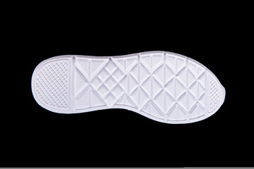 white shoe sole. Isolated on a black background.