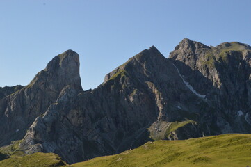 Hiking in the lush and dramatically beautiful Val di Fiemme and Passo Rollo in the Dolomites,...