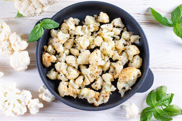 Roasted cauliflower with herbs and spices. Healthy concept, vegetarian food