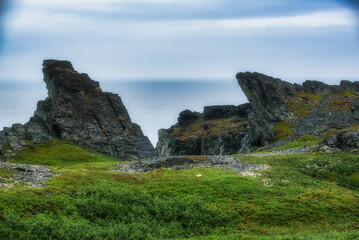 Northern landscapes of Cape Kekursky on the Sredny peninsula in cloudy weather. Kola Peninsula. Murmansk region, Russia