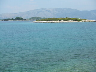 Fototapeta premium The beautiful Adriatic Sea surrounded by the Dalmatian Mountains, in Korcula, Croatia.