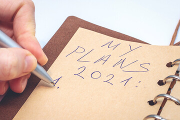 New Year Resolution Goal List 2021 - notebook written in handwriting about plan listing of new year...