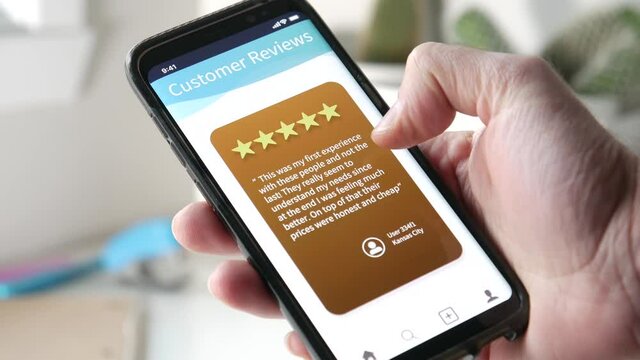 Reading many customers reviews online on a smartphone. Swiping between many different comments.