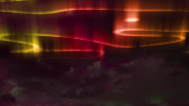 Animation of aurora borealis glowing trails in orange and red over landscape at night