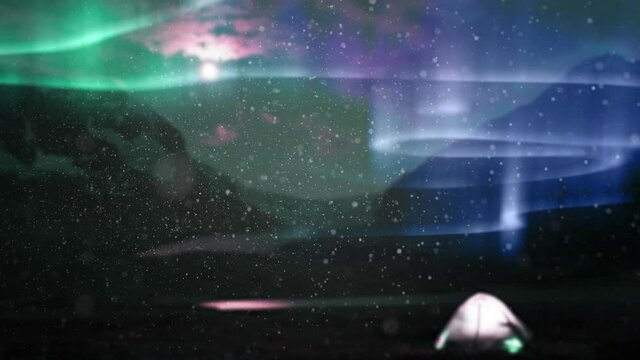 Animation of aurora borealis glowing trails in green and purple with snow falling over night sky