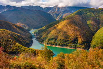 Fototapeta na wymiar the lake of Vagli and the Apuan Alps seen from the Careggine plateau of Garfagnana, Tuscany