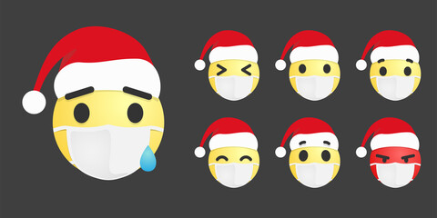 Fototapeta premium Vector set of emoticons in mask and santa hats