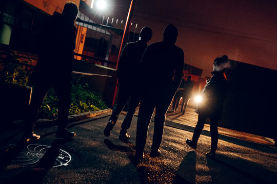 Friends leave the party and go to the exit